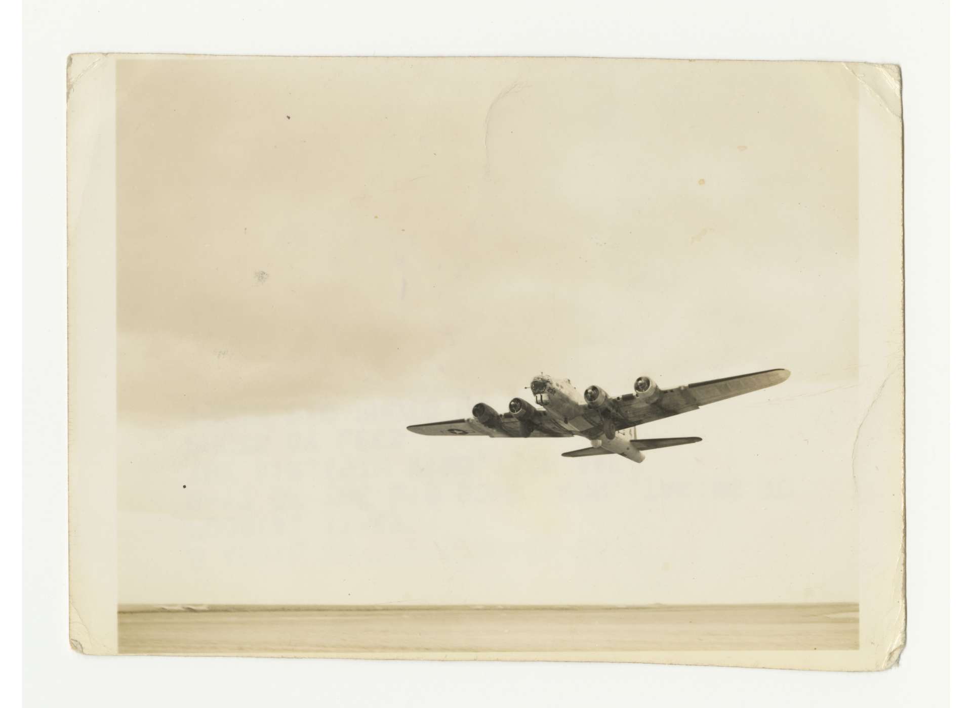 B-17 Flying Fortress of the 419 Bombardment Squadron, 301st Bombardment Group, Fifteenth Air Force, takes off from an airfield near Foggia, April 8, 1945. US Army Signal Corps photo, gift in memory of William F. Caddell, Sr., from the Collection of The National WWII Museum, 2007.048.108.