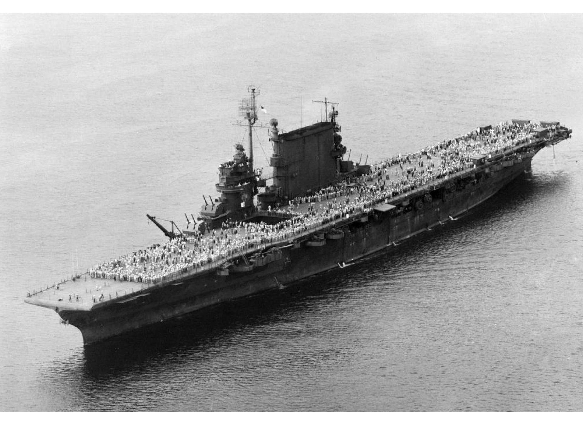 The USS Saratoga (CV-3) en route to the United States during her last run as a troop transport during Operation MAGIC CARPET. By the end of the operation, Saratoga had redeployed 29,204 veterans of the Pacific war, more than any other single ship.