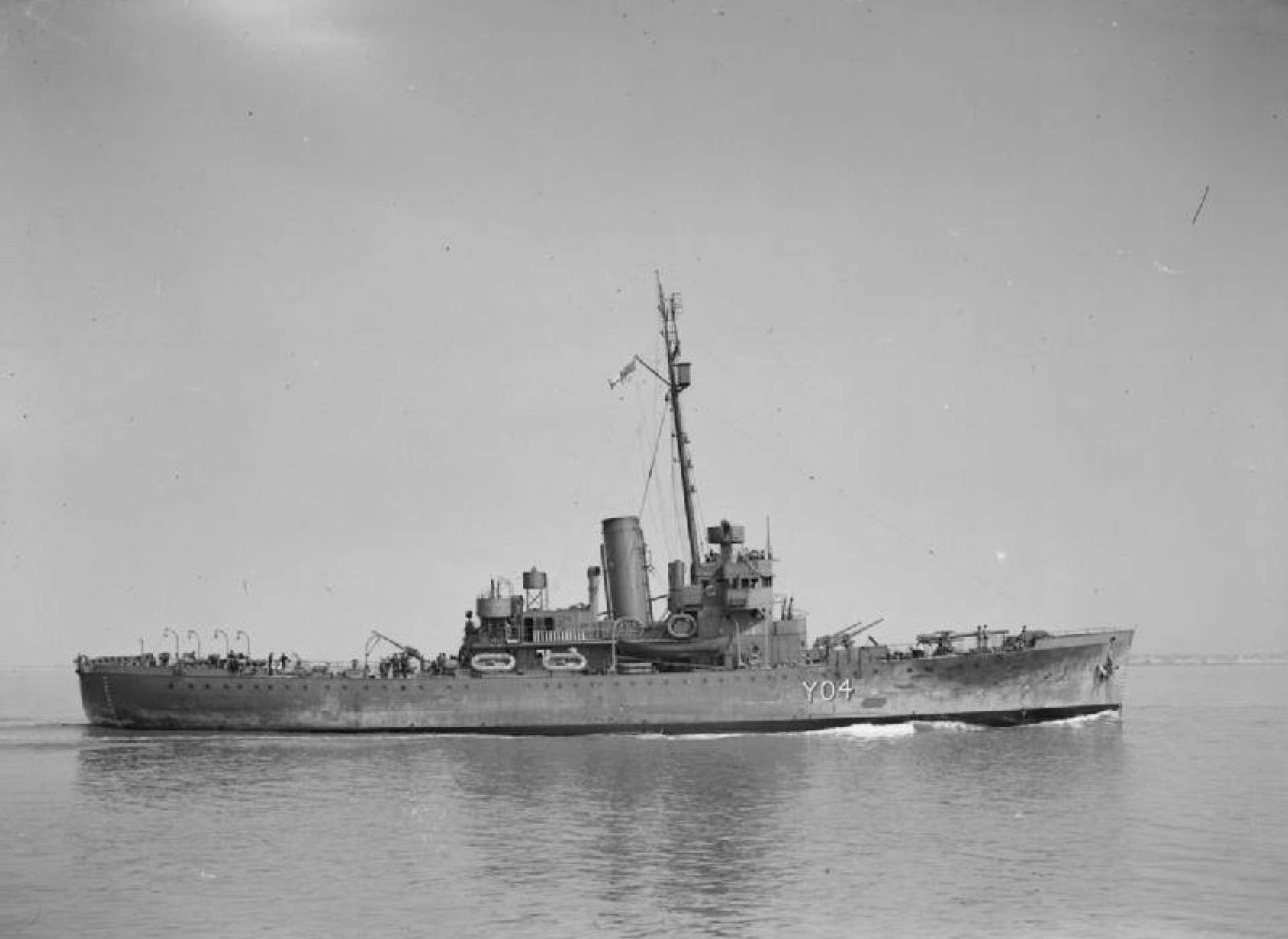 HMS Walney, originally a US Coast Guard cutter (USS Sebago), was transferred to the Royal Navy in 1941 under Lend-Lease. She led the assault into the Oran Port on November 8, 1942, but met an unfortunate fate, sinking short of her intended objective. (Imperial War Museum photo, IWM A 5322