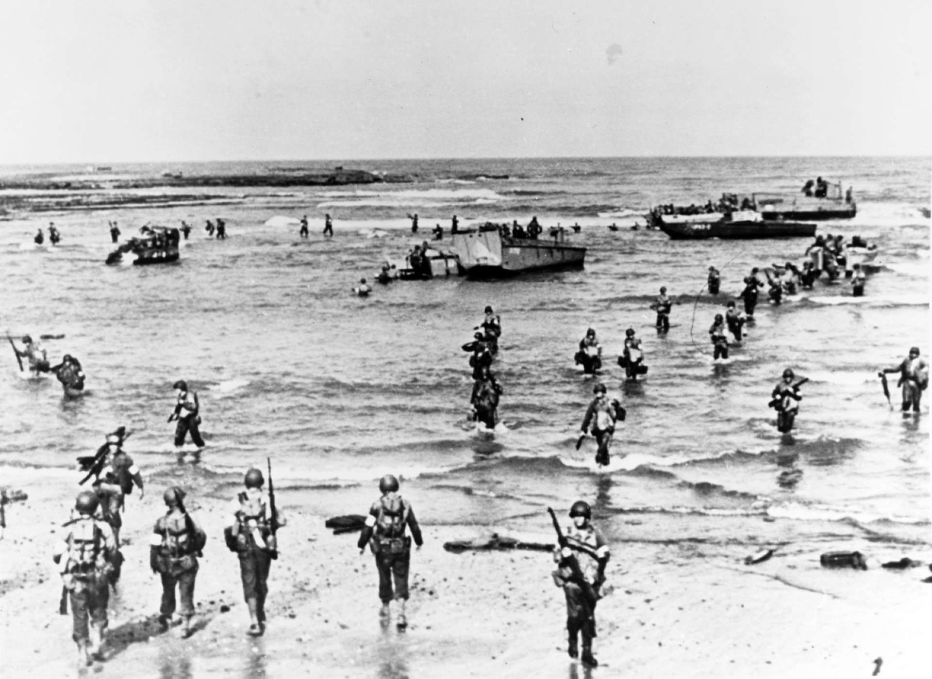 US Troops landing in French Morocco, November 8, 1942, as a part of Operation TORCH. Despite very little experience with amphibious operations, the US Army conducted nine separate landing at three different objective areas. (US Navy Photo)