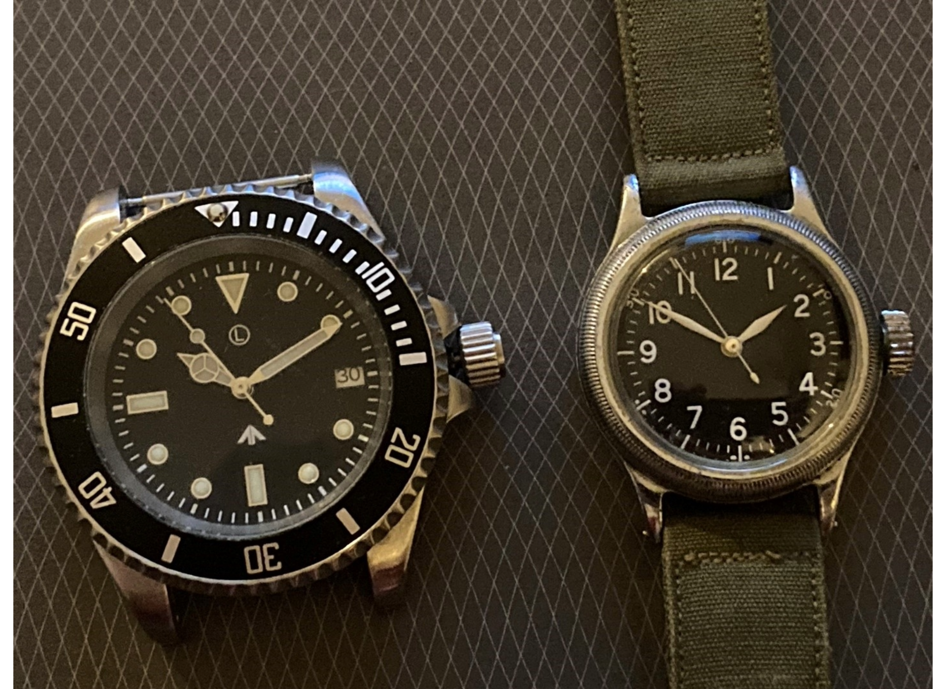 Rolex Submariner watch compared to a 1944 Bulova A-11