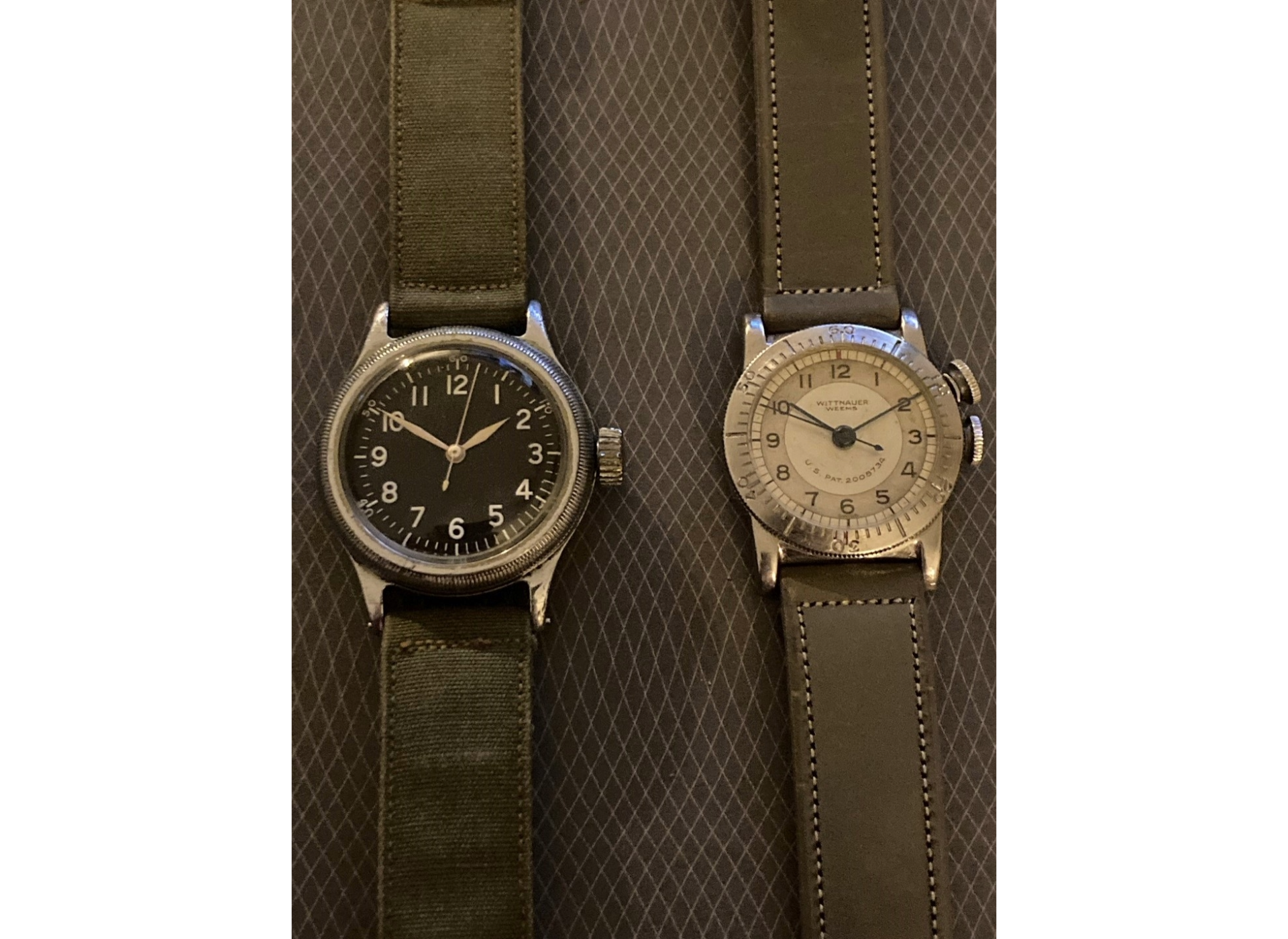 A 1944 Bulova A-11, left, and 1943 Weems