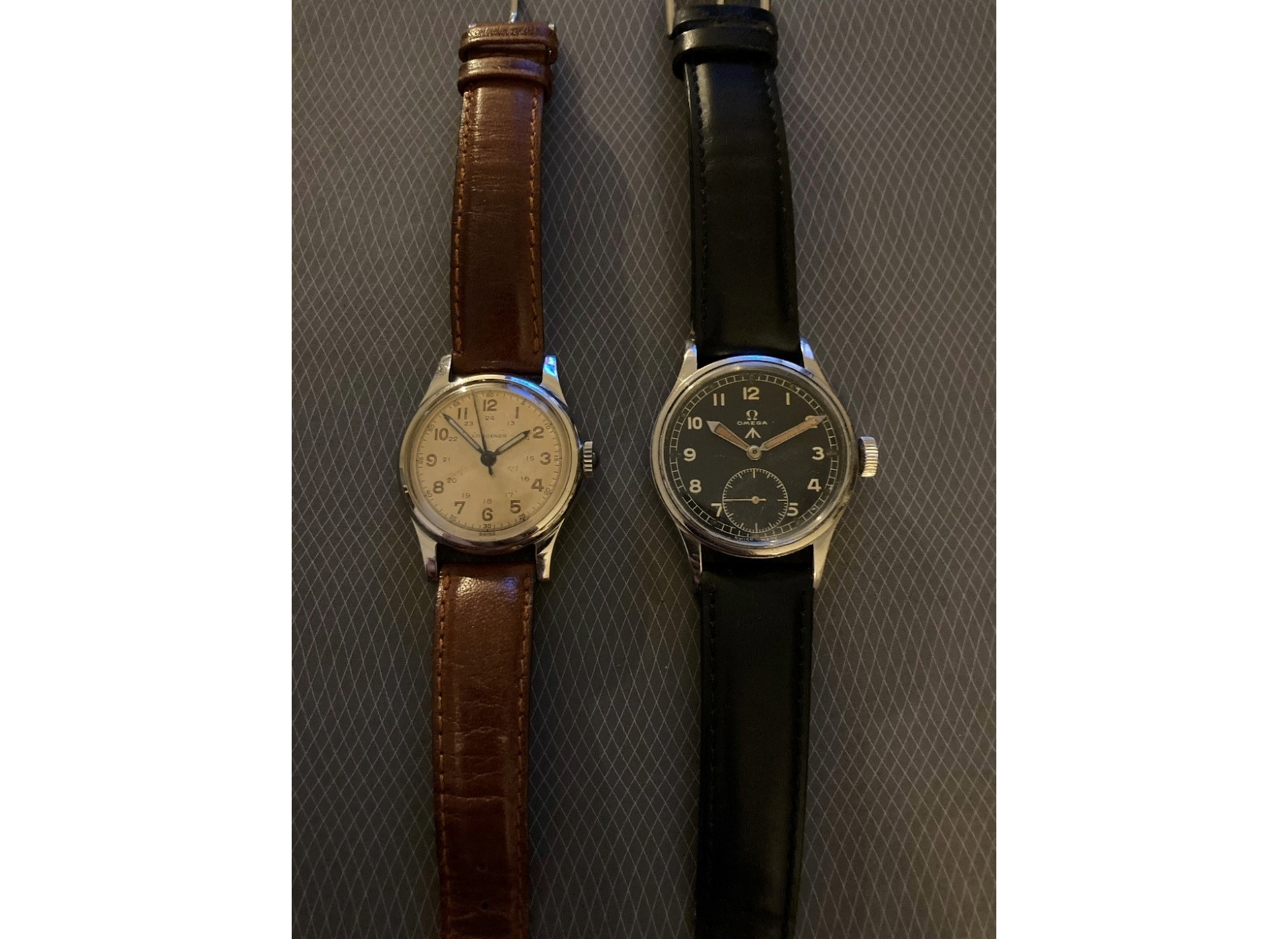 A 1945 Longines US Navy issue, left, and a 1945 Omega WWW watch