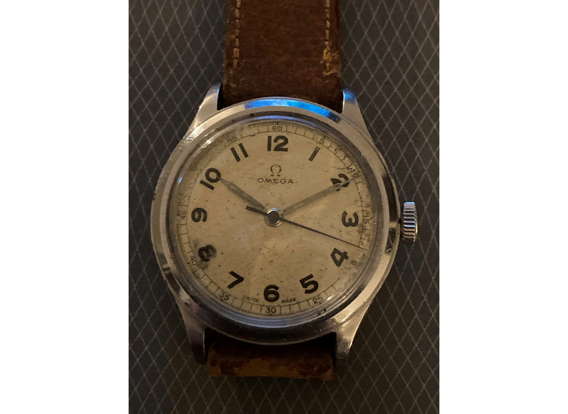 By 1945, the US Army in Europe was also buying Swiss watches to meet demand, such as this Omega with an unusual treatment of the 3 and 9 numerals.