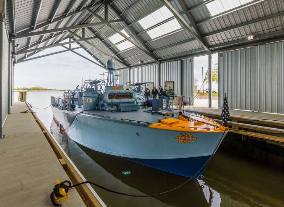 PT-305 in its boathouse