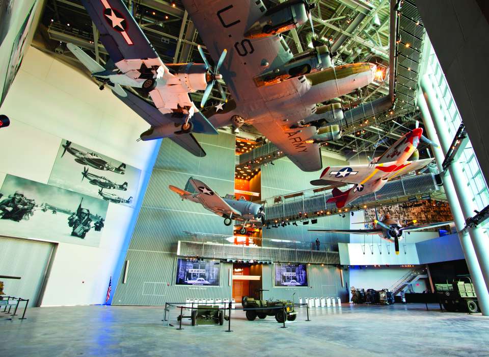 National WWII Museum interior with hanging airplanes