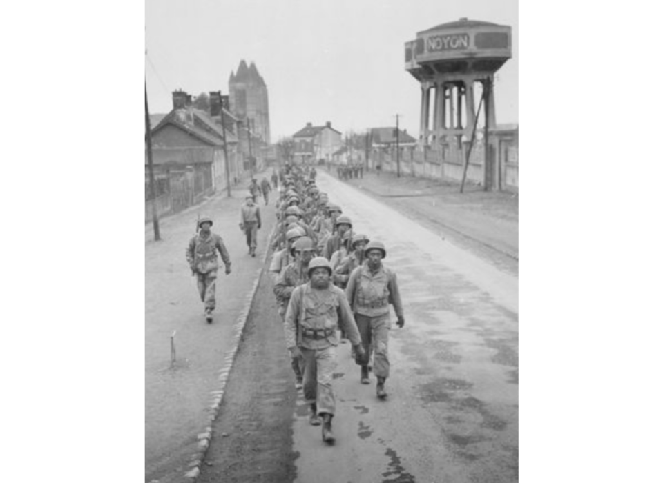 Black Volunteer infantry soldiers prepare for a day&#039;s training in preparation for shipment to veteran units at front lines in Germany. Courtesy National Archives and Research Administration, National Archives Identifier: 531357, Local Identifier: 111-SC-337901.