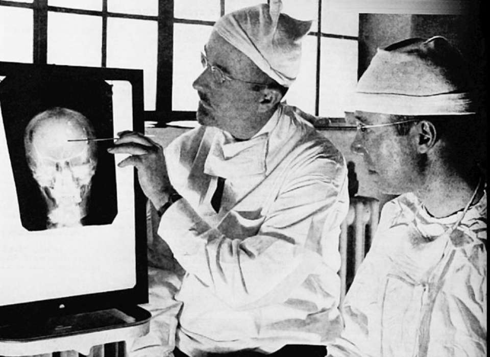 Walter Freeman and James Watts planning lobotomy in 1941, via Wikimedia Commons