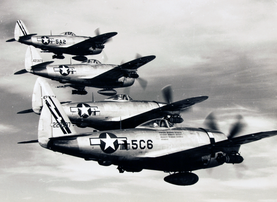 A formation of Republic P-47s prowl for targets