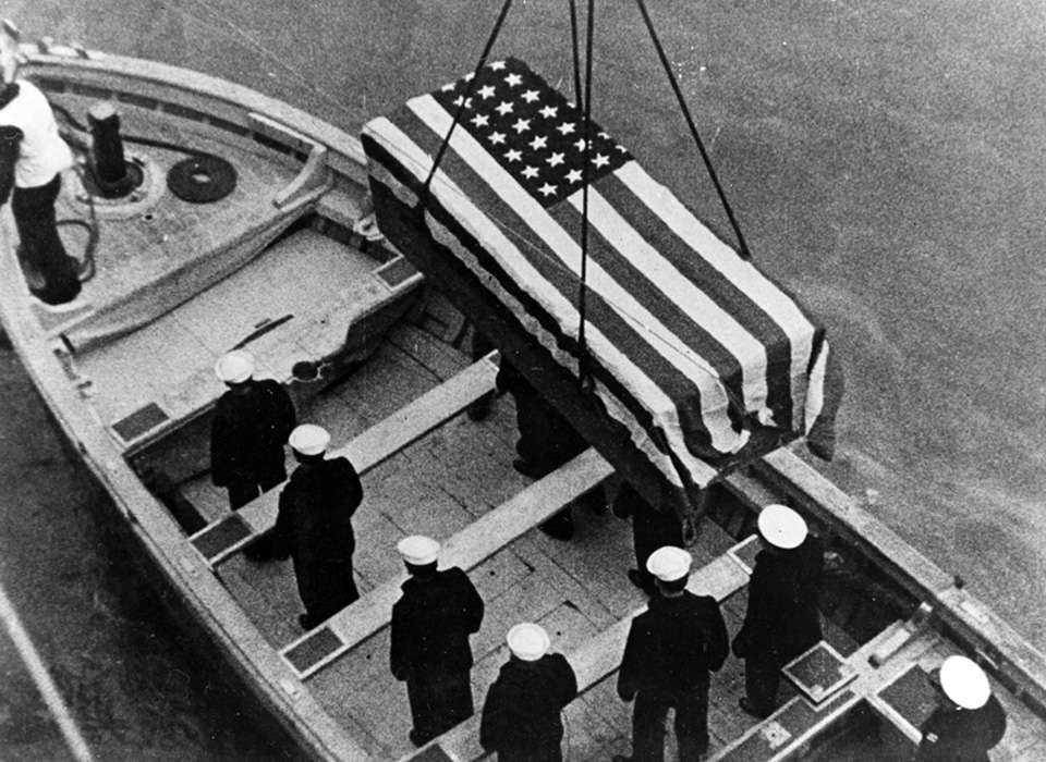 View of the coffin of an American sailor killed in the Japanese bombing of USS Panay on December 12, 1937