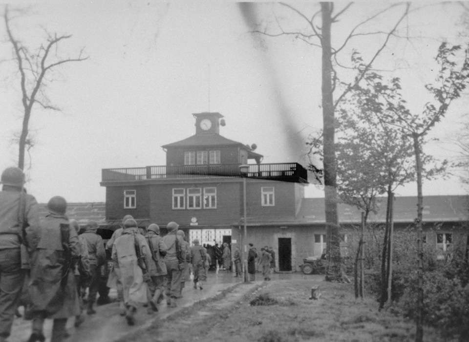American soldiers march into Buchenwald upon liberation of the camp