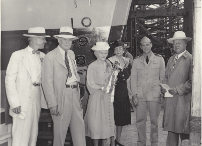 Guests prepare for Mrs. Brown to launch one of her sons&#039; warships.