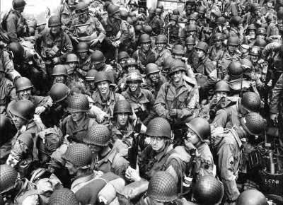 Soldiers packed on a boat during WWII