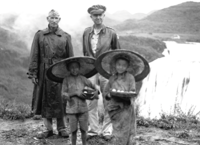 Lieutenant General William Hood Simpson and General Albert C. Wedemeyer with two children, August 1945.