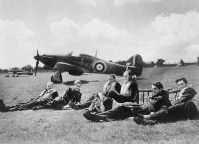 Royal Air Force (RAF) pilots during the Battle of Britain, with a Hawker Hurricane Mk I P3522 in the backdrop
