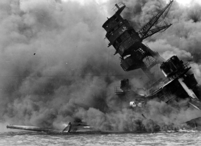 The USS Arizona burning after the Japanese attack on Pearl Harbor