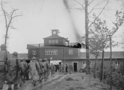 American soldiers march into Buchenwald upon liberation of the camp